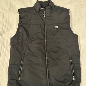 Vuori men’s Echo Insulated Vest.Black w/ camouflage on inside.  Size XL.